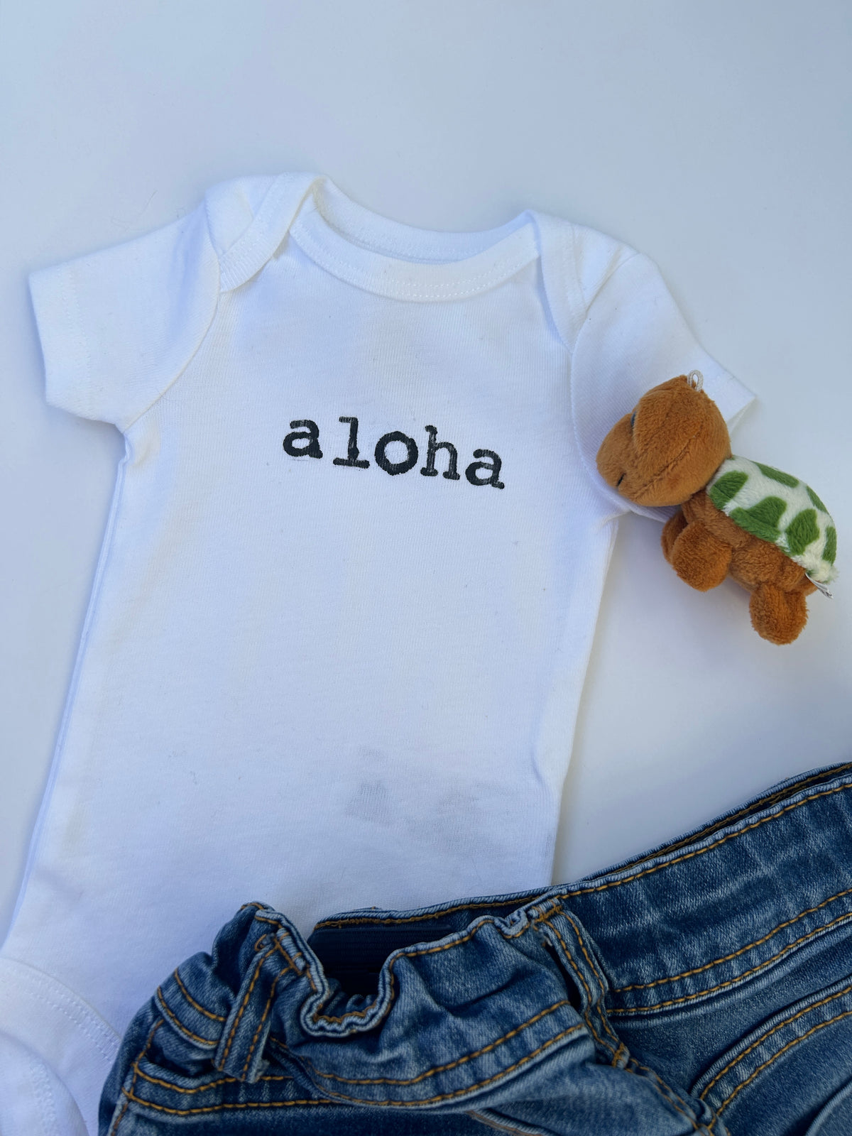 Aloha Hand-Stamped Baby Bodysuit