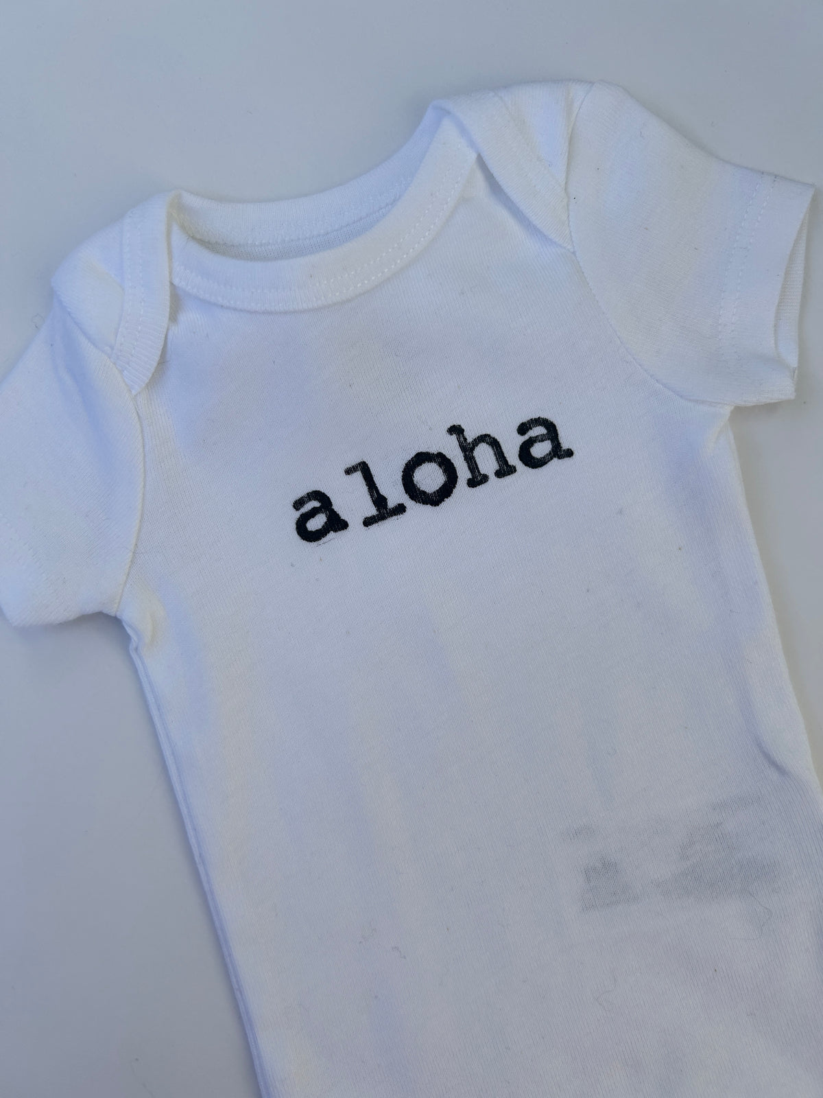 Aloha Hand-Stamped Baby Bodysuit
