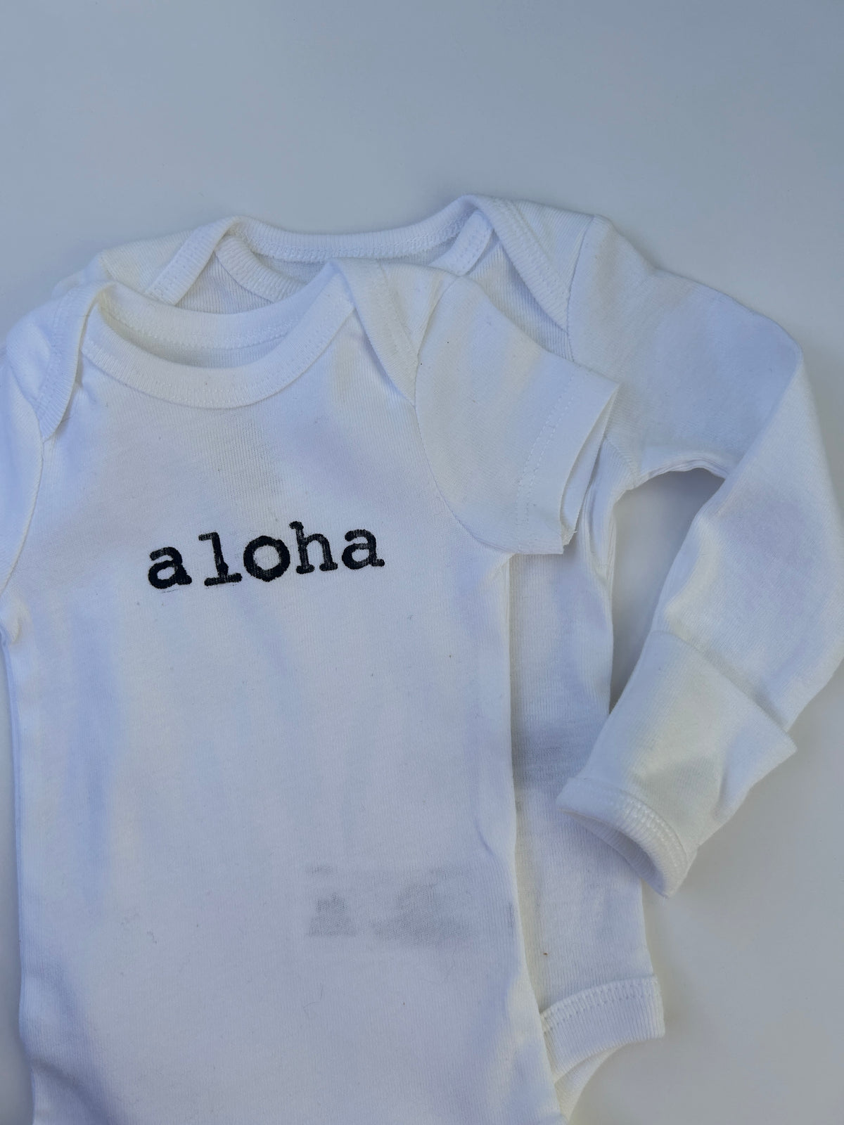 Aloha Hand-Stamped Baby Bodysuit