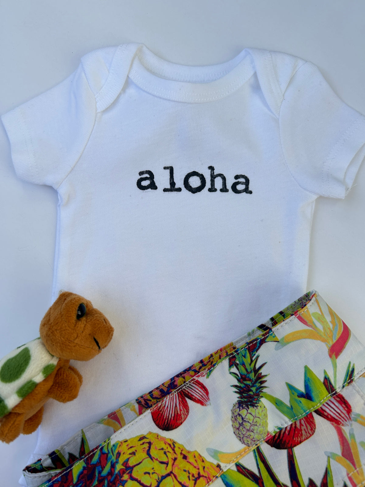 Aloha Hand-Stamped Baby Bodysuit